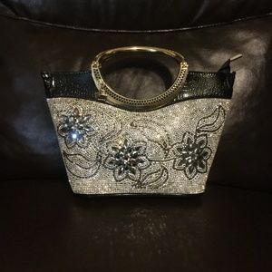 Small black glittery handbag